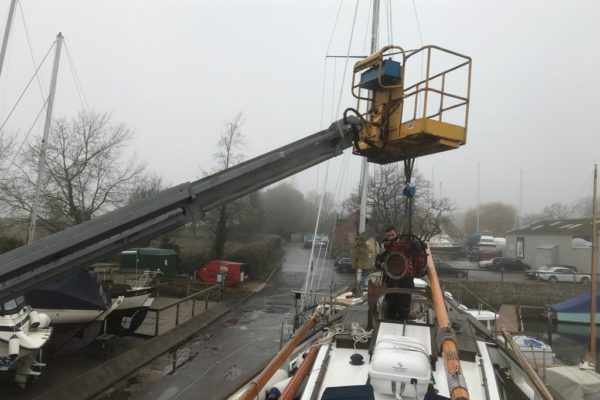 Boleh’s volunteer Skippers will not be sorry to wave goodbye to the Beta, seen here being lifted out of the main hatch. Refit plans schedule mid-March for installation of the new generator.