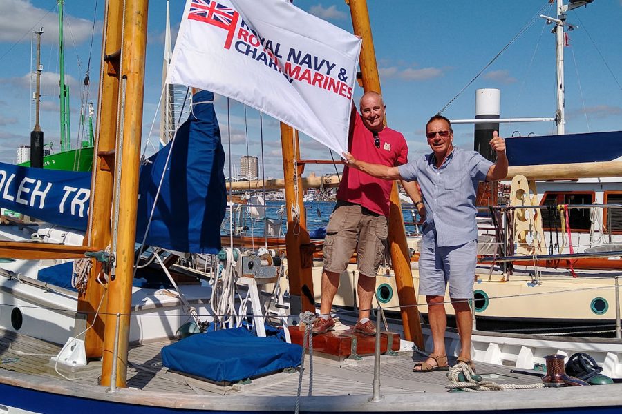 Mark and Chris onboard with the Flag